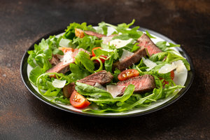 Beef tagliata with rocket and cherry tomatoes