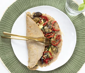 Buckwheat pancake with fried vegetables