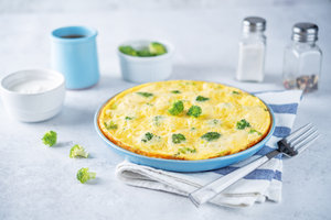 Cacio e pepe frittata with broccoli and lemony yoghurt