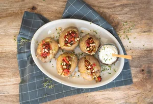 Baked potato with red salsa