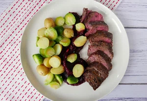 Steak with beetroot puree and Brussels sprouts