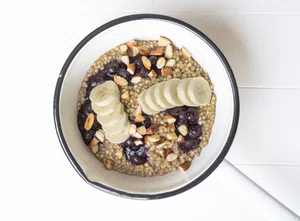 Buckwheat breakfast-bowl with banana and blueberries