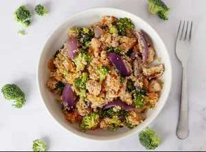 Warm couscous salad with chicken and roasted vegetables