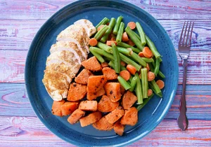 Pan fried chicken with curried sweet potato and vegetables