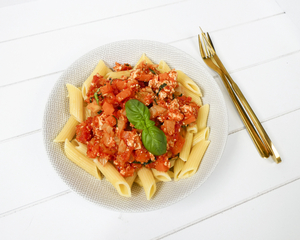 Penne with tofu, fennel and carrot in tomato sauce