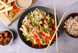 Buddha bowl with tempeh and peanut dressing