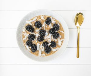 Buckwheat oatmeal with blackberries and coconut