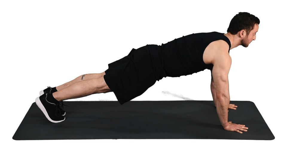 How to do Chaturanga Dandasana or Four-Limbed Staff Pose - DoYou