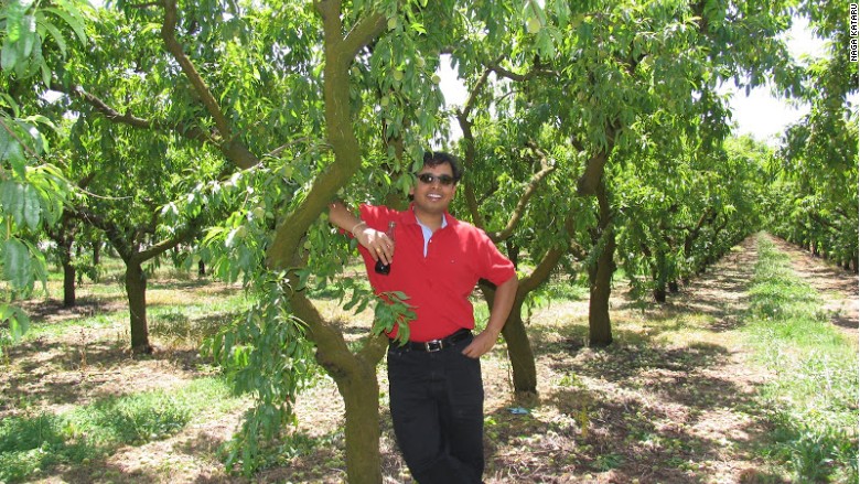 Kataru enjoying a cold beverage on his farm