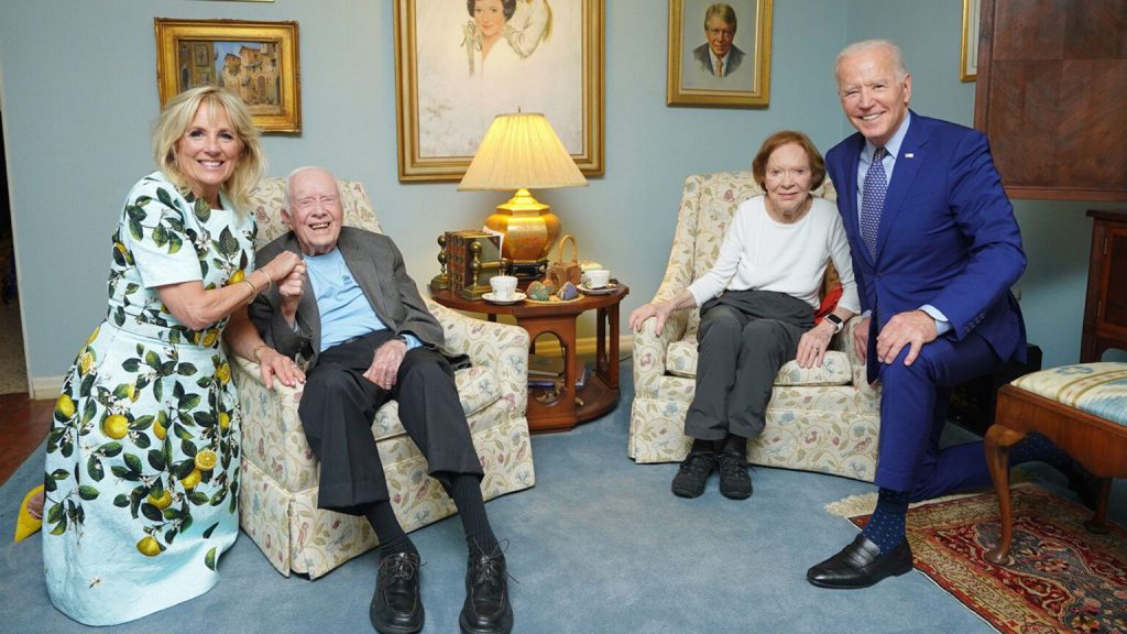 Demonstration of effects of wide angle lens, as Joe and Jill Biden appear enlarged.