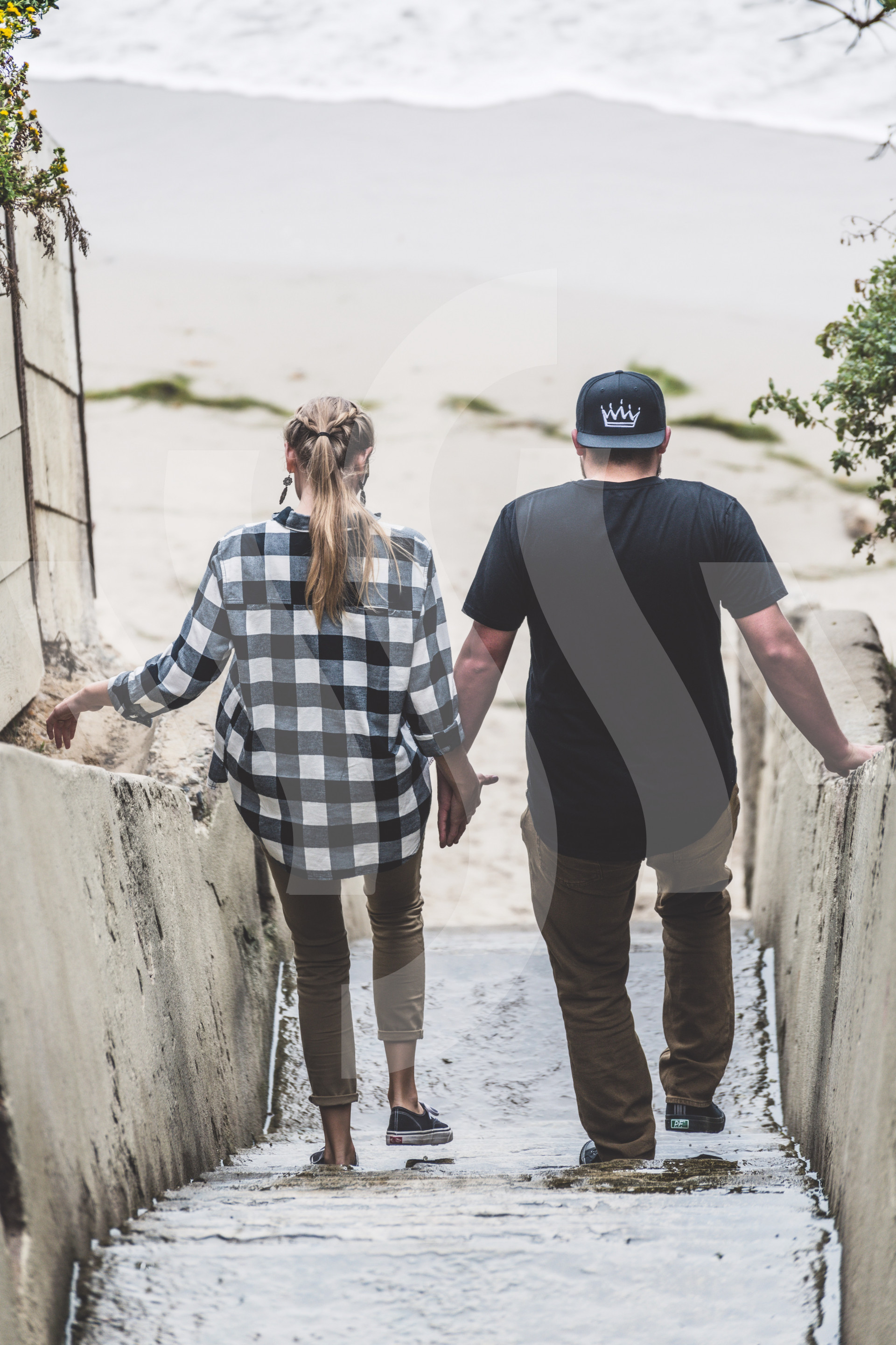 Walking Down Steps Hand in Hand