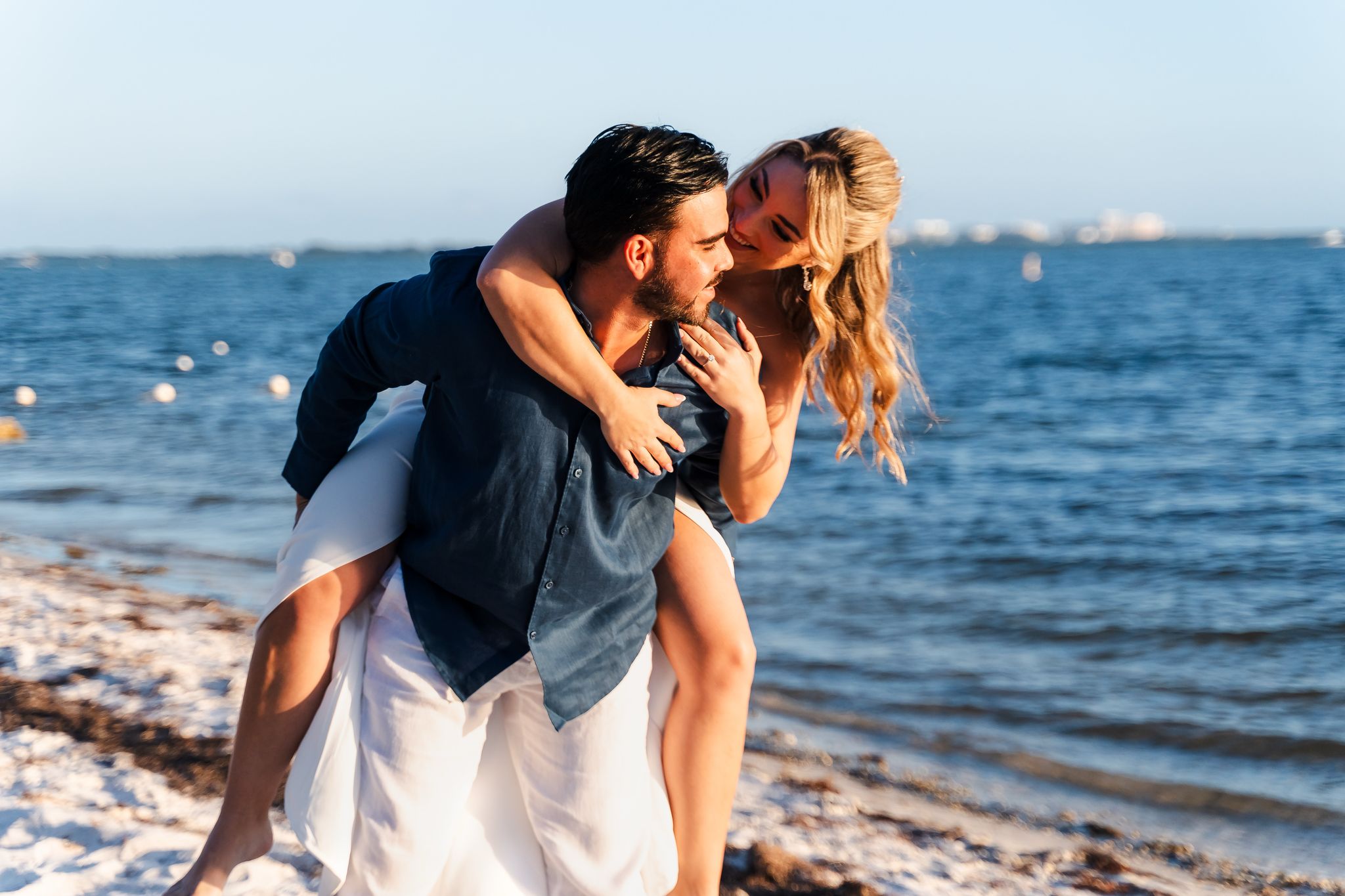 Couple at their intimate beach wedding ceremony on Crandon Park, Key Biscayne