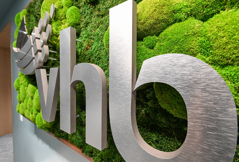 VHB Ethos on green wall