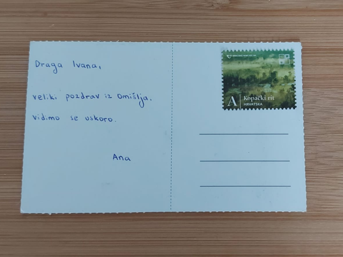 na gornji desni kutak zalijepite poštansku markicu