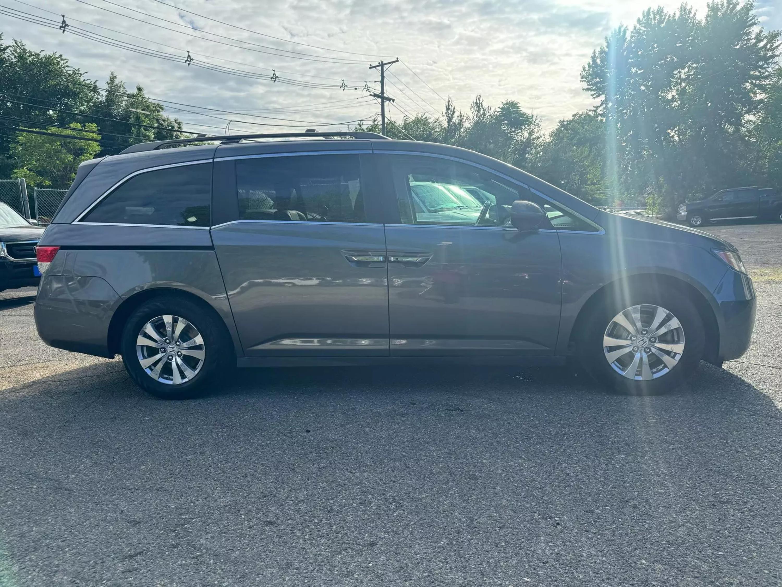 Used 2014 Honda Odyssey EX-L with VIN 5FNRL5H69EB020924 for sale in Garfield, NJ