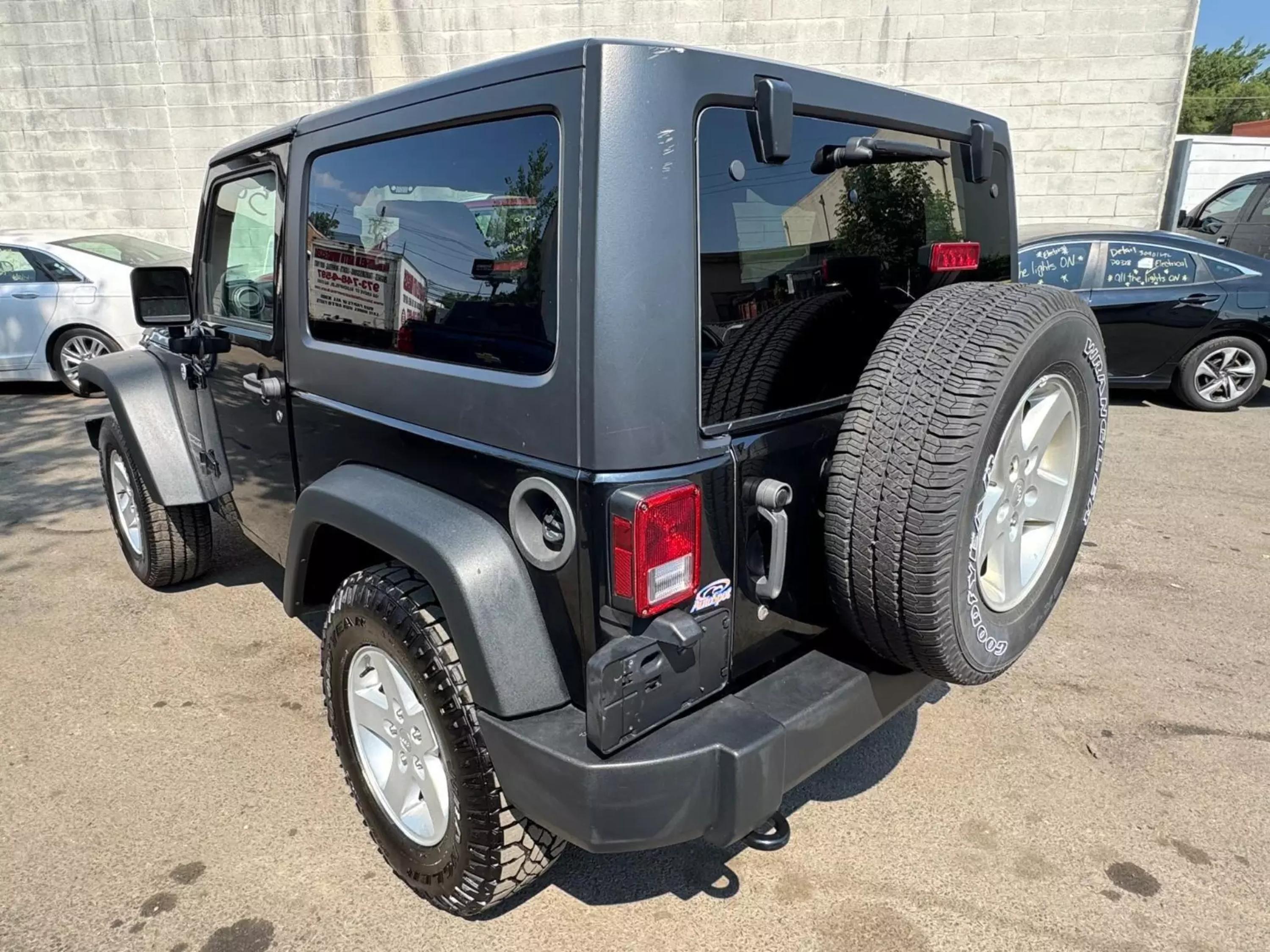 Used 2015 Jeep Wrangler Sport with VIN 1C4AJWAG5FL644259 for sale in Garfield, NJ