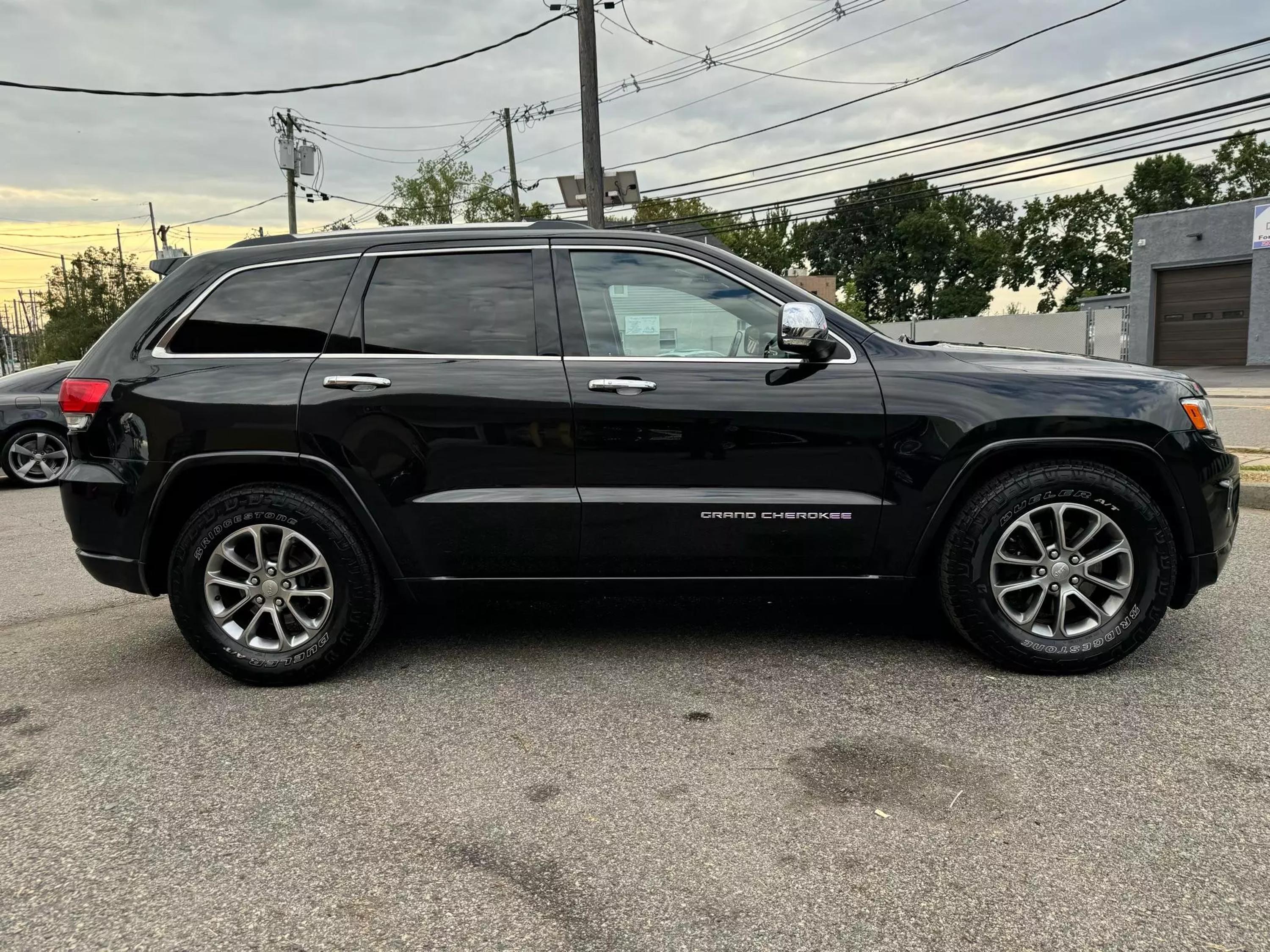 Used 2014 Jeep Grand Cherokee Overland with VIN 1C4RJFCM7EC324039 for sale in Garfield, NJ