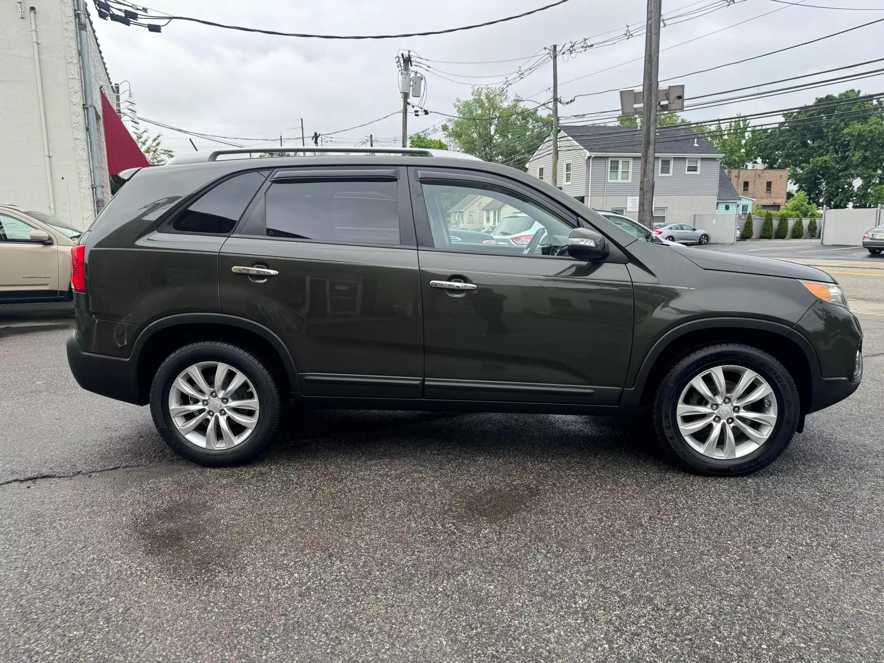 Used 2011 Kia Sorento EX with VIN 5XYKU3A1XBG114414 for sale in Garfield, NJ