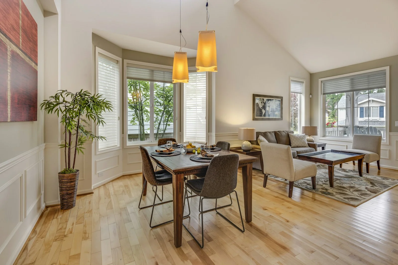 Sunlit modern living room with empty walls awaiting a housewarming gift