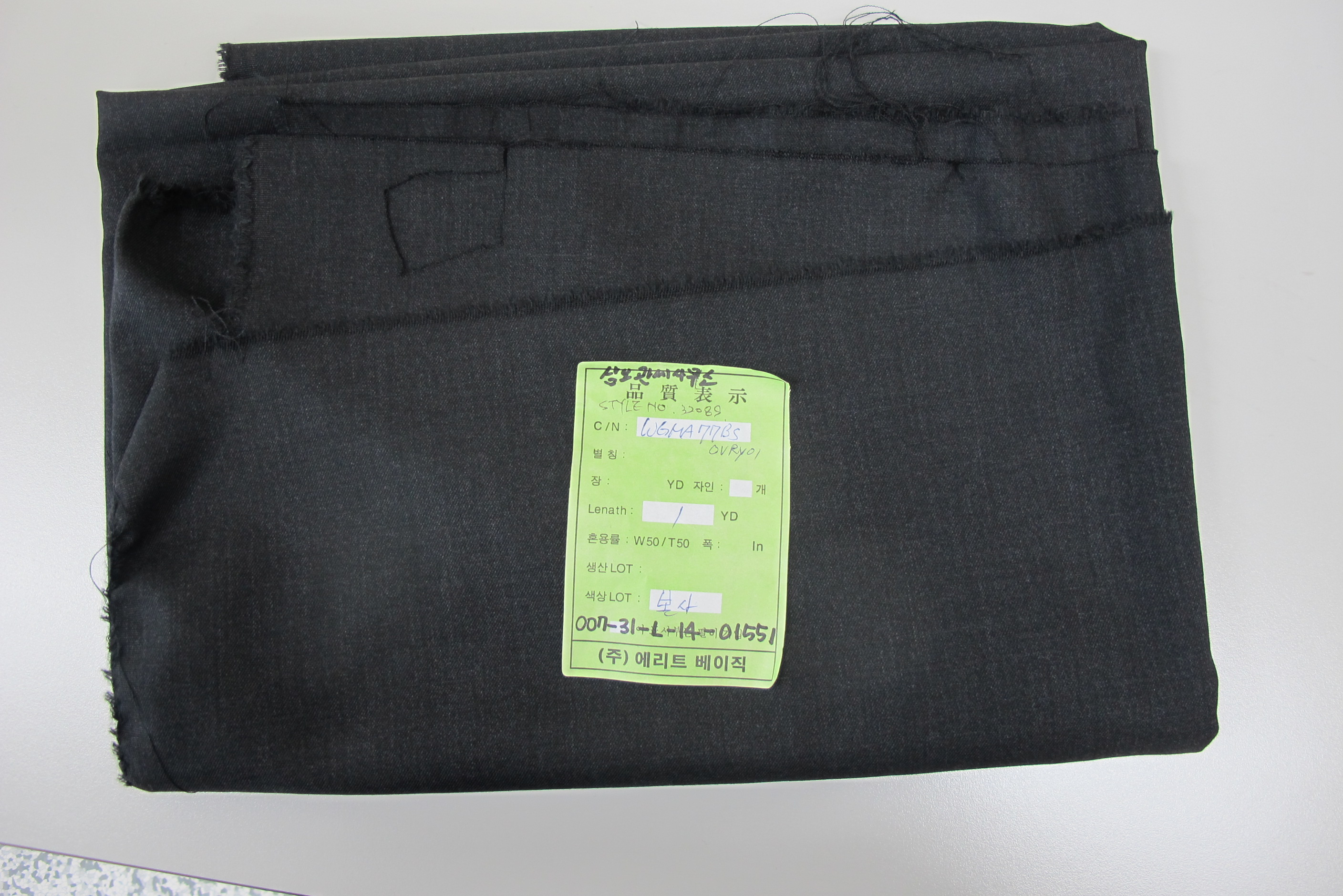 Woven fabrics of polyester staple fibres mixed mainly with wool, dyed; WORSTED FABRIC; STYLE NO.32089; PR.CHINA