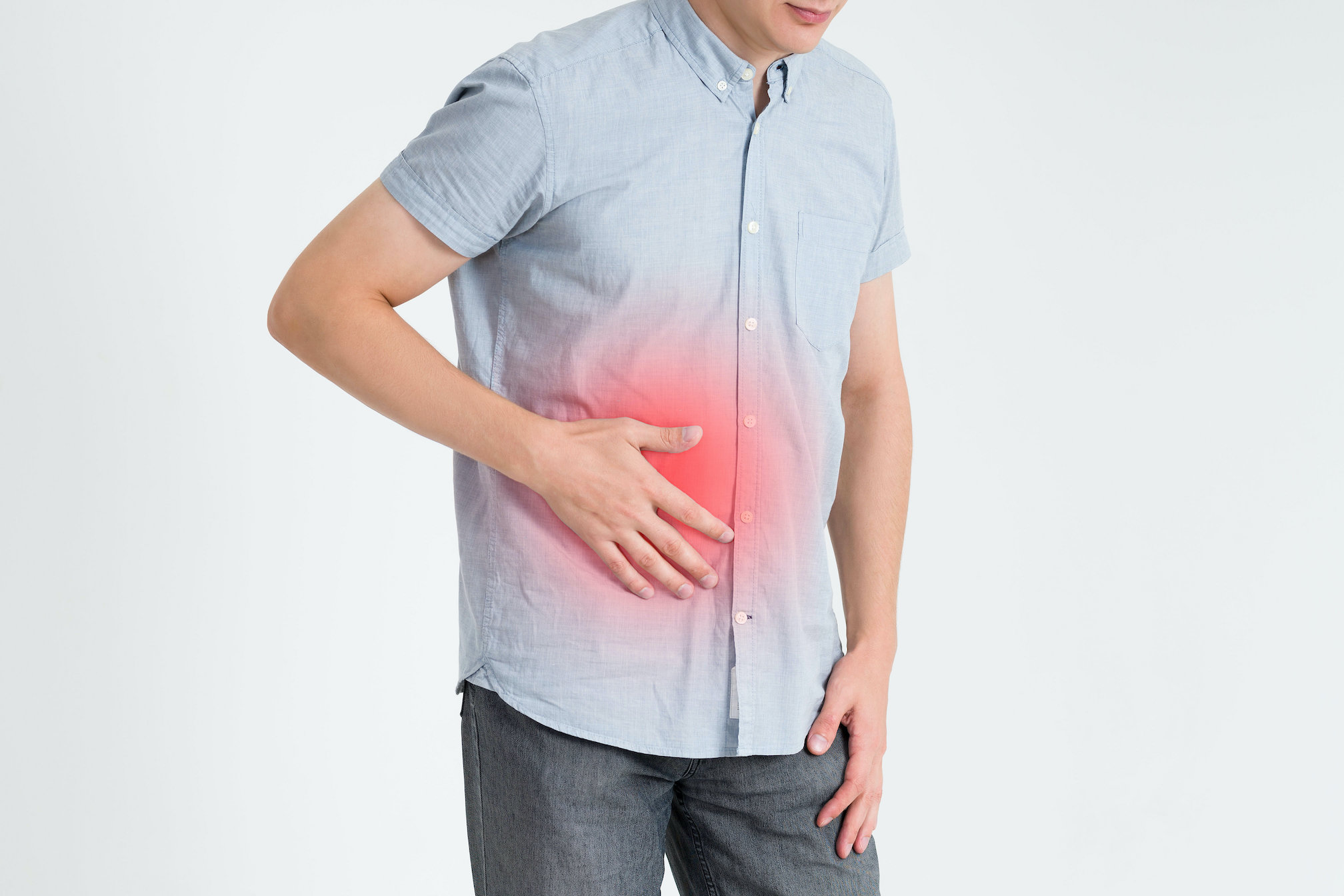 An image of a man holding his gut