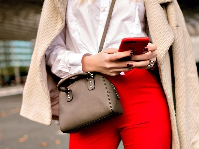 woman wearing sling bag