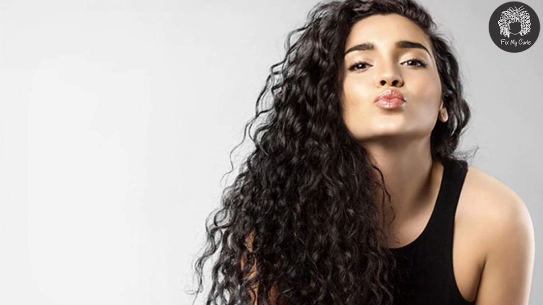 5 Reasons Your Curls Are Frizzy & 5 Products To Tame Your Mane