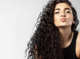 5 Reasons Your Curls Are Frizzy & 5 Products To Tame Your Mane