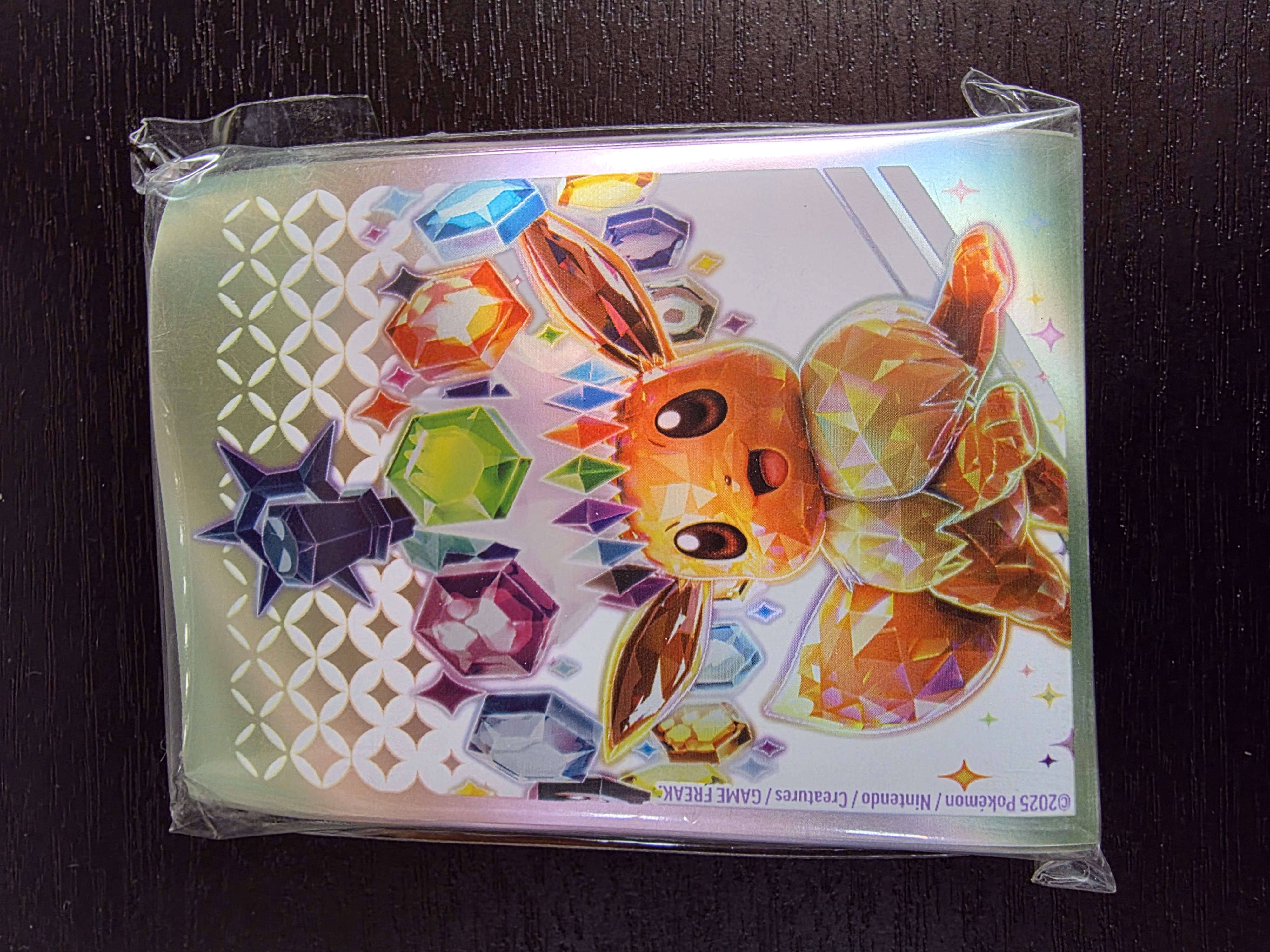 Eevee 65 Protectores Prismatic Evolutions Elite Trainer Box Pokemon
