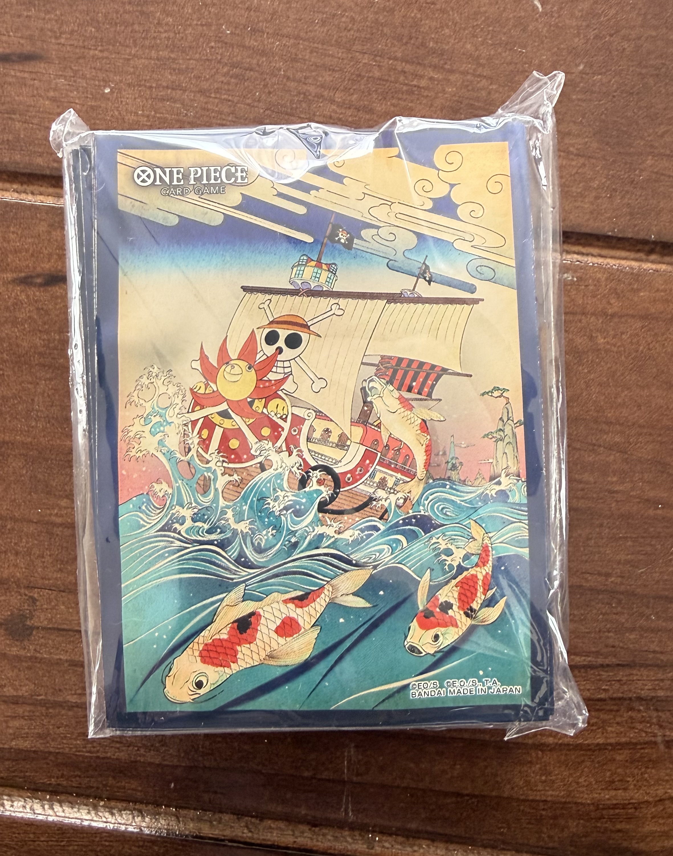 Protectores one piece tcg 1er aniversario 