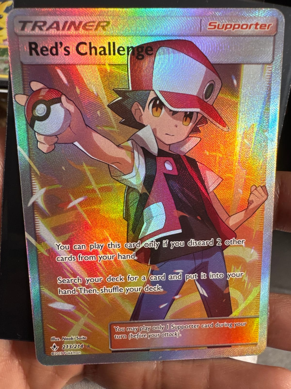 red's challenge pokemon card 213/214 PSA 9 Graded (Unbroken Bonds) You may play only 1 Supporter card during your turn (before your attack) Red's Challenge (Full Art) -