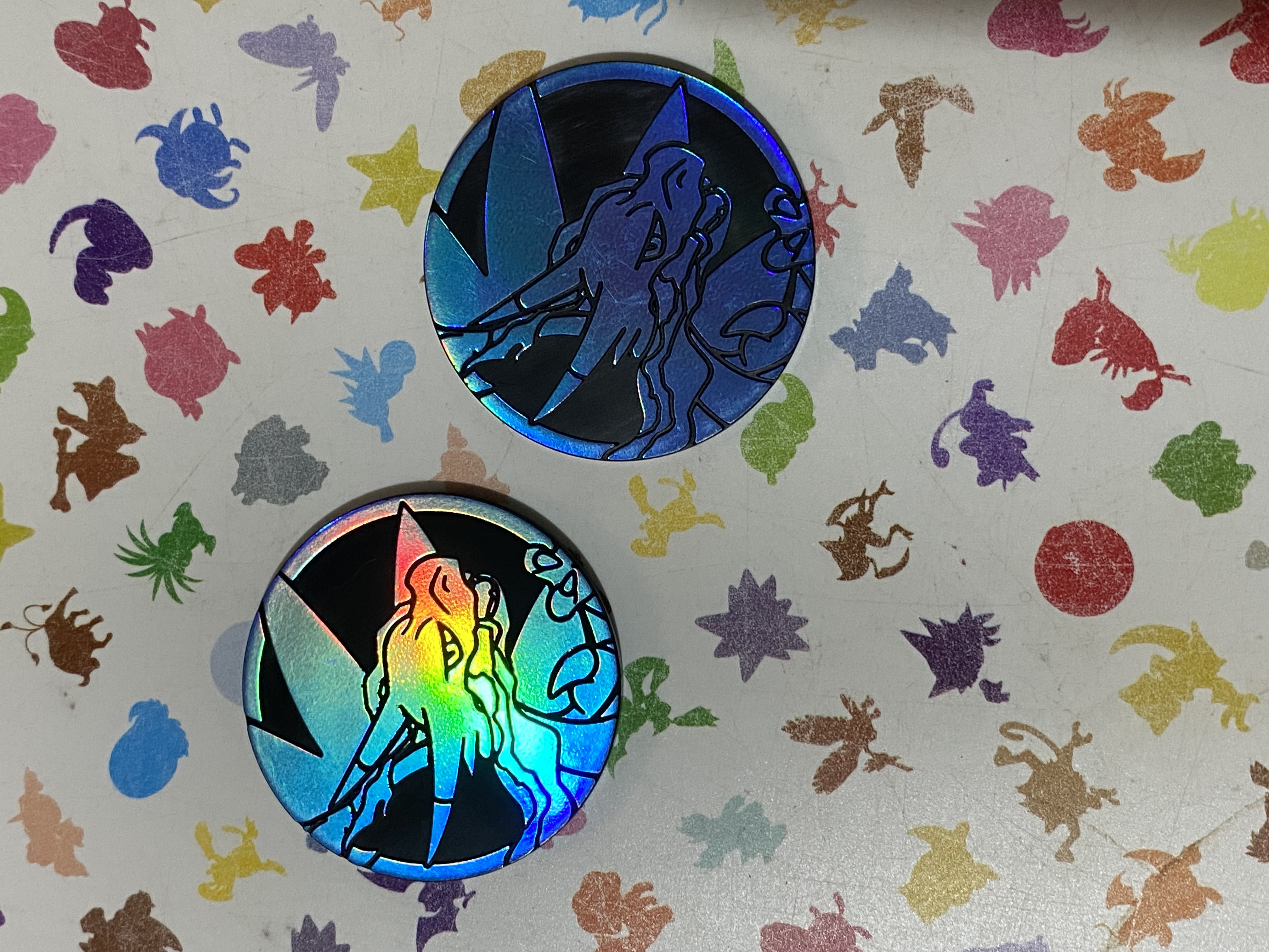 MONEDA MEGA CHARIZARD X