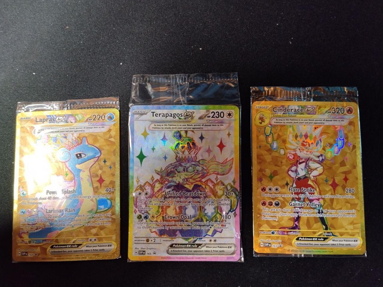 Set de 3 promos Terapagos Cinderace EX, Terapagos Ex, Lapras Ex SELLADOS