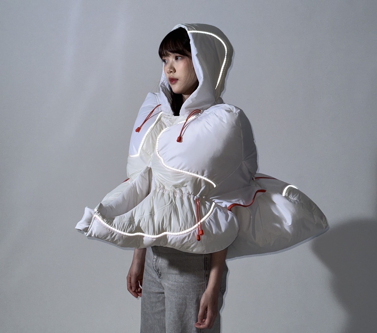 Reflective design of raincoat at night.