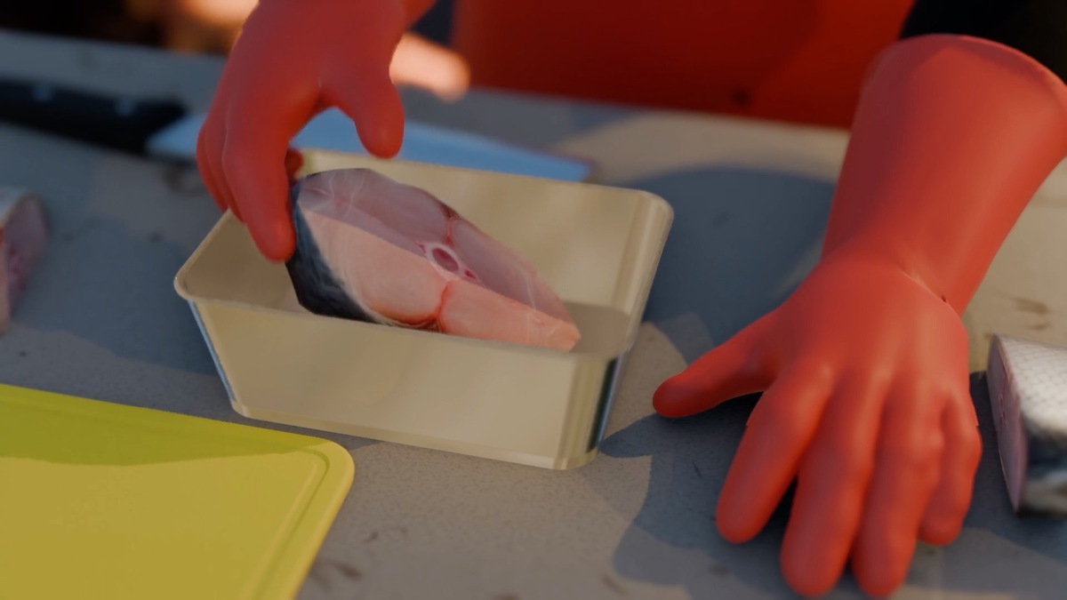 回憶中身為魚販的母親，正在切魚給孩子。