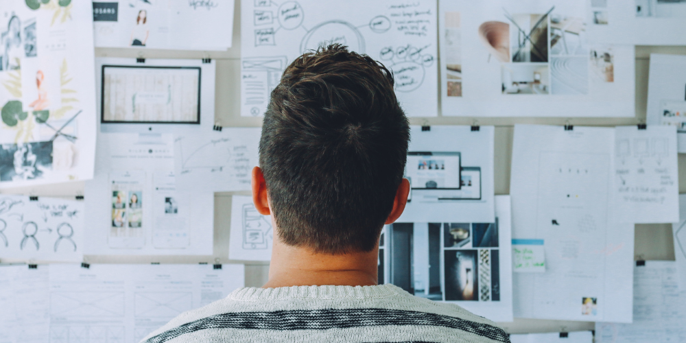 Person looking at a board with task