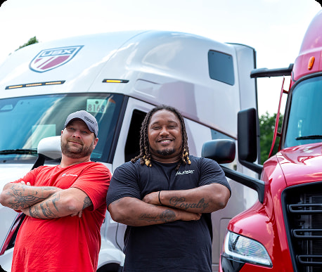 Two guys infront of truck