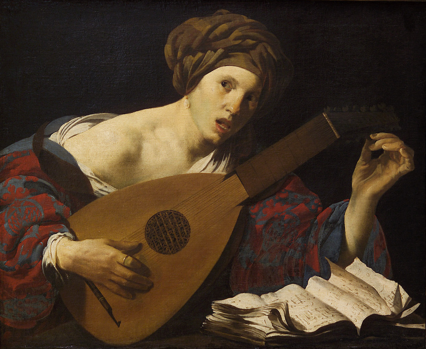 Hendrick Terbrugghen | The Lute Player | Displayed motifs: Human face, Guitar, Person, Man, Madonna, Clothing, Human hand, 