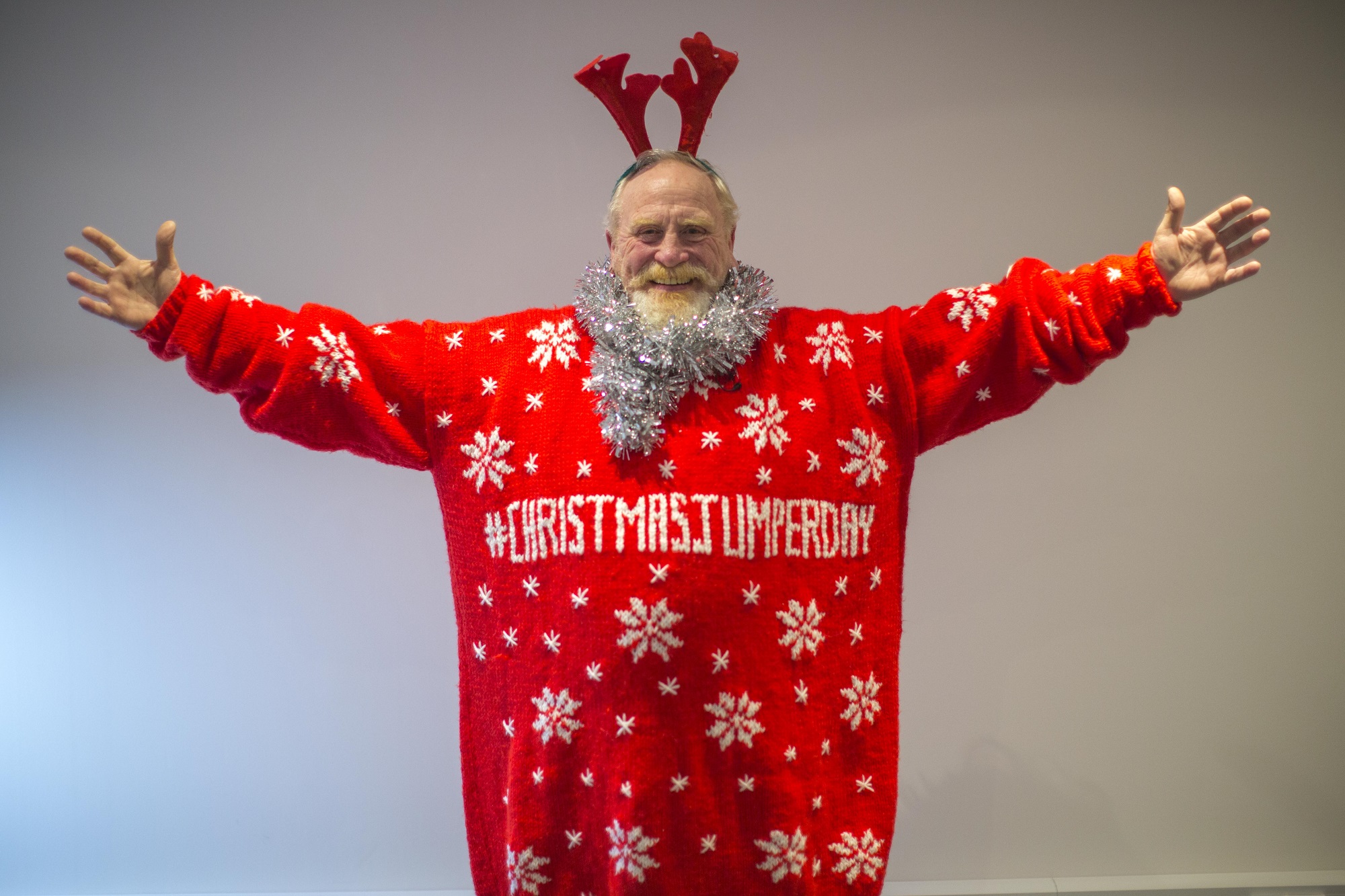 celebs in christmas jumpers