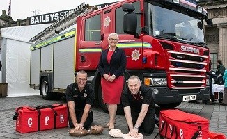 Dave Boyle, Catherine Kelly and John Miller, station manager at Tollcross Fire Station, Edinburgh