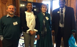 Happier times: Able Miller (right) at the Positive Action in Housing AGM (c) Robina Qureshi