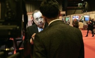 First Minister Alex Salmond chats to a TV crew after his speech at the Gathering