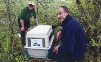 Simon Jones and colleague get ready to release a beaver at Knapdale in 2009. Picture: Steve Gardner