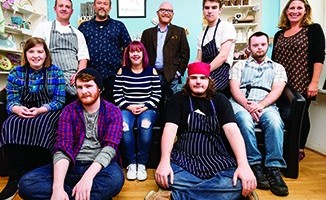 The team at Giraffe Café, with chief excutive Gareth Ruddock standing second from the left and local Masterchef winner Gary Maclean to his right.