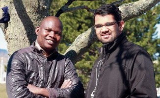 Cassio Malaki with his friend Manfred, who together started a foodbank in the Sighthill area of Glasgow