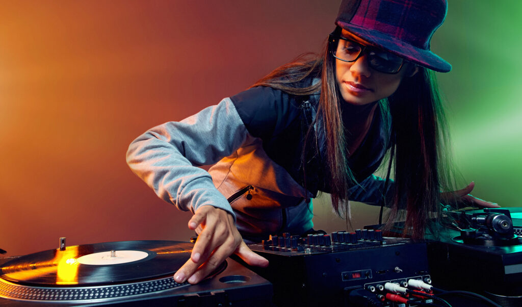 Hiphop dj woman playing at nightclub party lifestyle