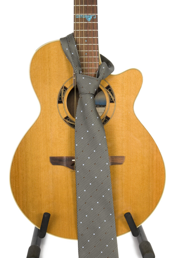 guitar with tie.