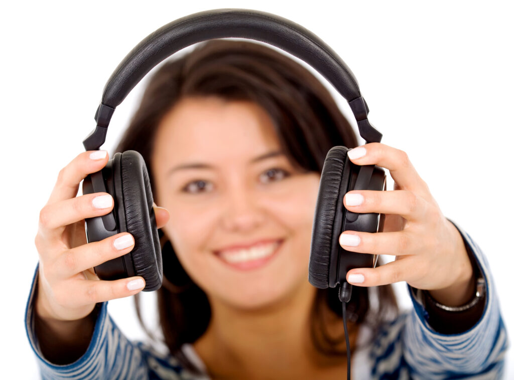 girl holding headphones