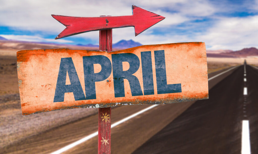 April sign with road background
