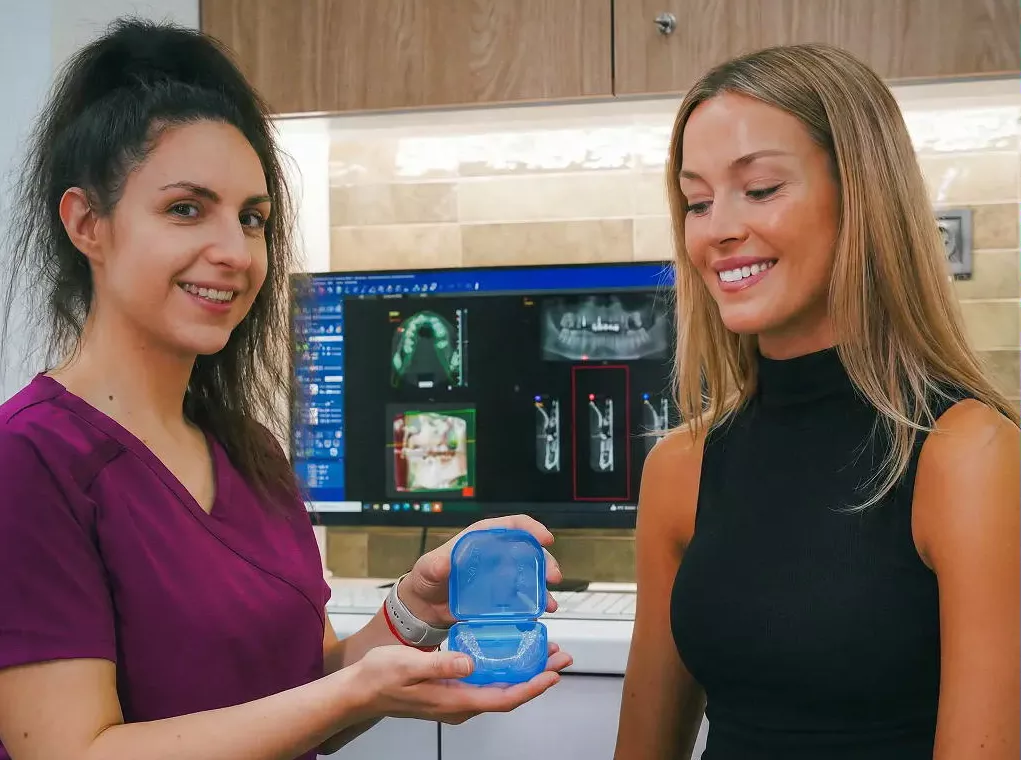 Image of the Dentist and a patient